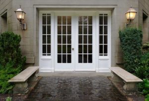 exterior doors leading to an outdoor stone path